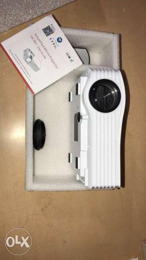 White And Black Camera Device With Box