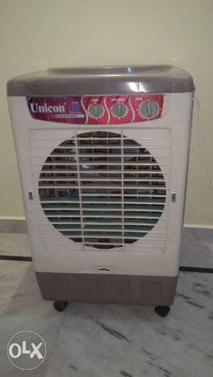 White And Gray Hi speed 25 liters Unicon Air Cooler. Working