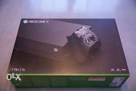 Xbox one x new sealed box packed