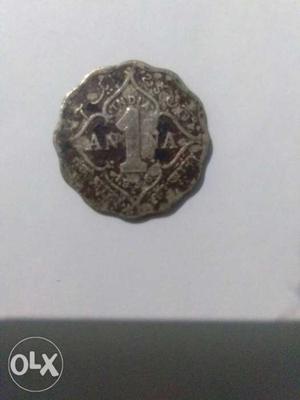 1 Silver-colored India Anna Coin