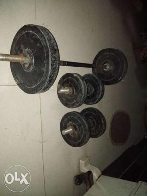 Barbell With Weight Plates And Dumbbell Lot