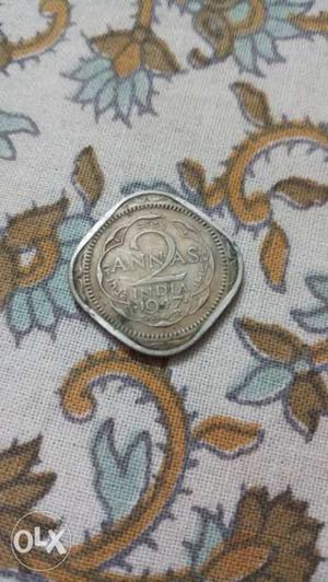 Silver-colored 2 Annas Indian Coin