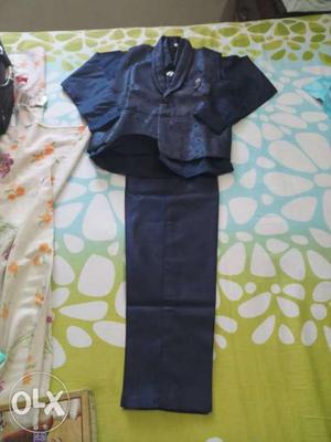 Blue colour full suit with shirt, pant, tie.