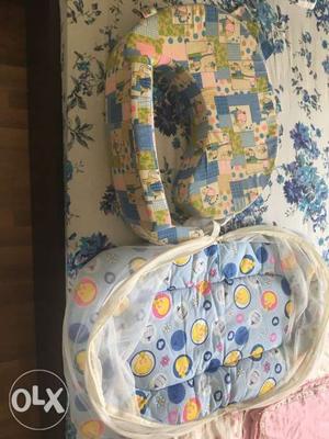 Brand new feeding pillow with baby net matress.