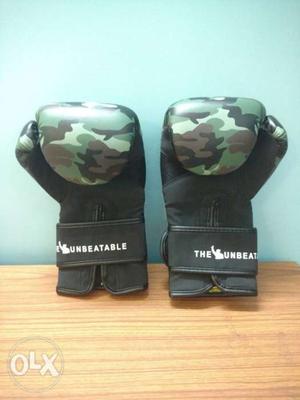 Brand new unused 10oz USI boxing gloves with bag.