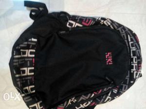 Branded wildcraft black and pink backbag