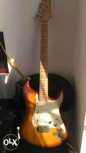 Brown And White Stratocaster Electric Guitar
