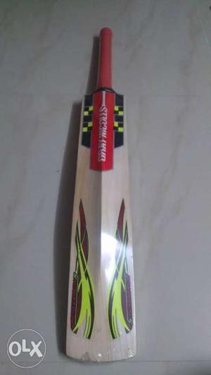 Brown, Red, And Yellow Gray-Nicolls Cricket Bat