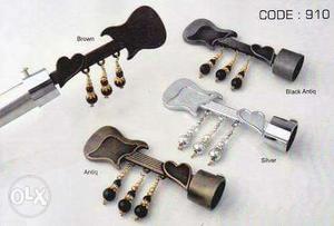 Gold, White, And Black Guitar Accessories