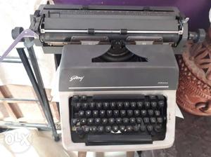 Gray Godrej Typewriter