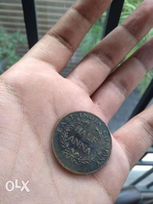 Round Black Indian Half Anna Coin