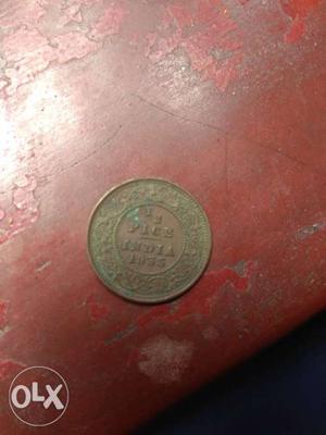 Round Copper-colored 1/2 Indian Paise Coin