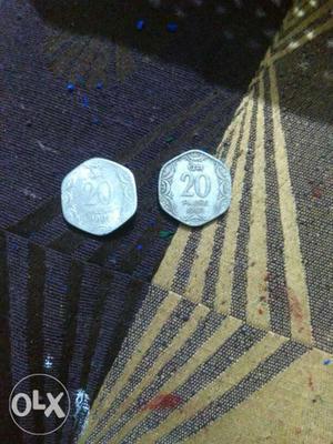 Two Silver-colored 20 Indian Coins