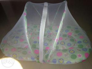 Unused Baby bed with mosquito net