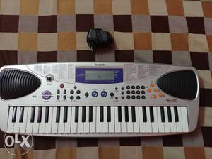 White And Black Casio Electronic Keyboard