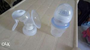 White And Blue Plastic Feeding Bottle