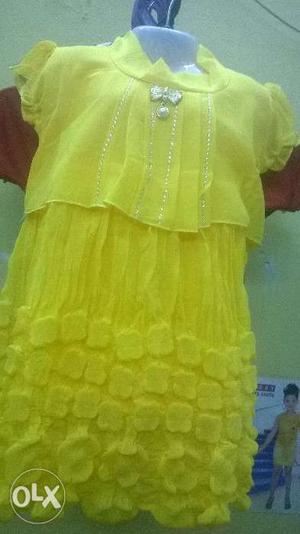 Yellow colour top 3year to 7 years size available