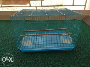 Bird cage with 2 feeder. Sparingly used.