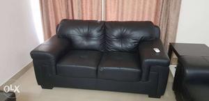 2 seater sofa leather from home center 1 yr old