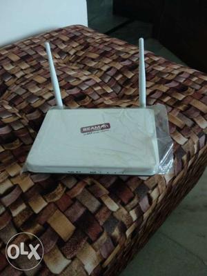 Beam/Act fibernet wifi Router. 2 years old but