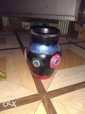 Black And Multicolored Clay Vase