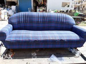 Black, Blue, And Red Plaid Suede Couch