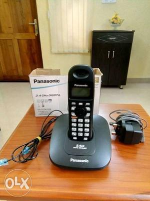 Black Panasonic Cordless phone.