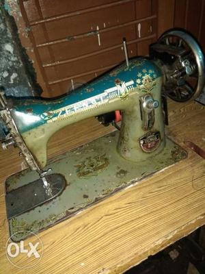 Brown And Teal Treadle Sewing Machine