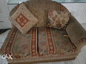Brown, Red, And Blue Floral Sofa