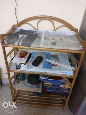 Cane rack with 4 shelves in very good condition