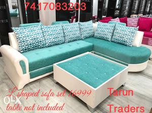 L shaped sofa set.table not included. tarun