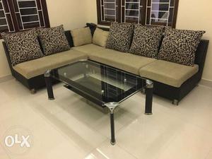 L shaped sofa with center table for sale