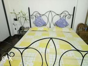Queen size wrought bed withside tables and4 inch