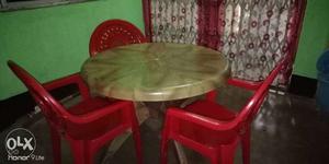 Red And White Wooden Table With Chairs