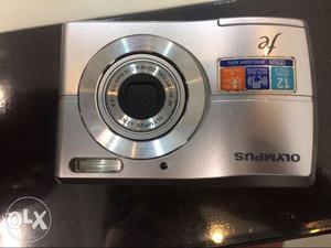 Silver Olympus Point-and-shoot Camera