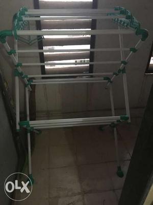 White And Green Cloth Drying Rack 1 month old