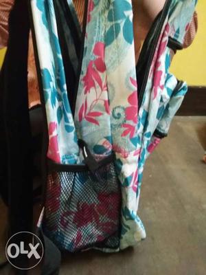 White, Pink, And Teal Floral Backpack