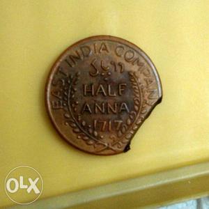 301 Old  Copper-colored Indian Half Anna Coin