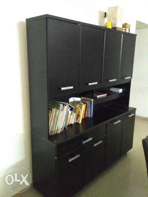 A storage cabinet in good condition is offered