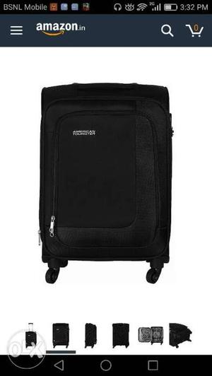 American tourister black four wheel trolley in