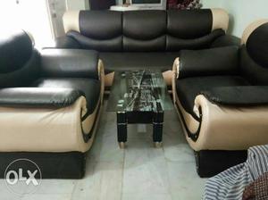 Attractive five seater sofa set with stylish table