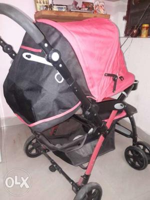 Baby's Black And Pink Stroller not used much. Fresh & new