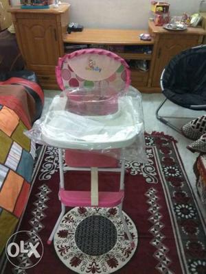 Baby's Pink And White High Chair almost new