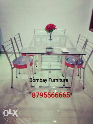 Brand new SS Dining table with 6 chair