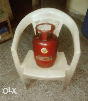 Chair & Small Cylinder [one plastic chair (Rs