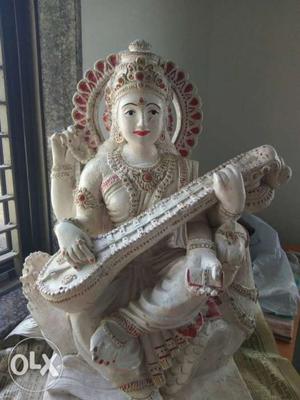 Devi Saraswati idol... made up of white cement.