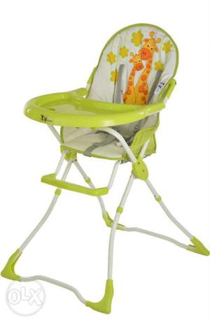 Green And White Highchair With Tray