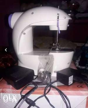 Mini Sewing Machine..very less used