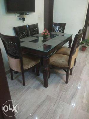 Pure teak wood dinning table with six chairs,