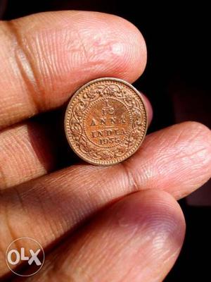 Round Copper-colored Indian Anna Coin